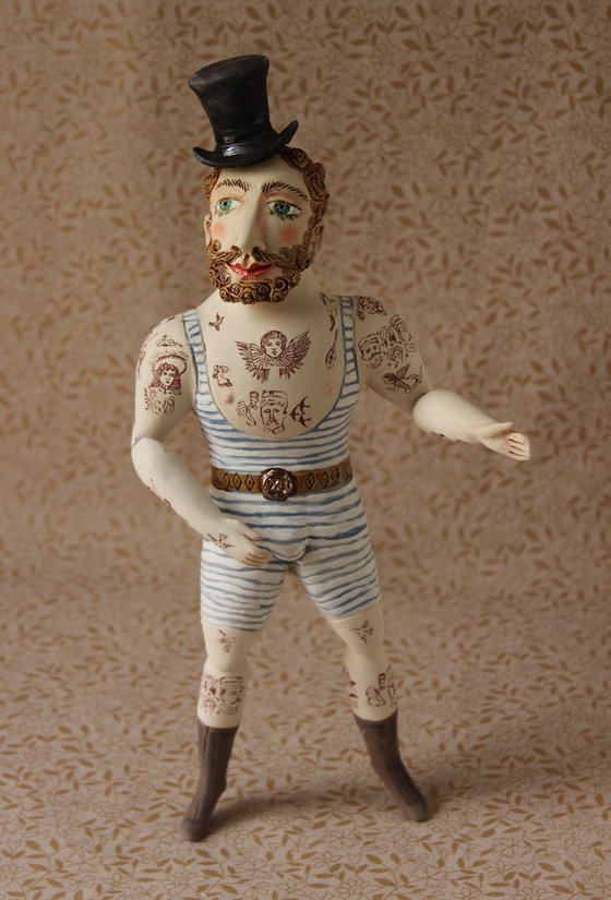 Circus athlete with hipster beard. Wall sculpture by Elya Yalonetski.