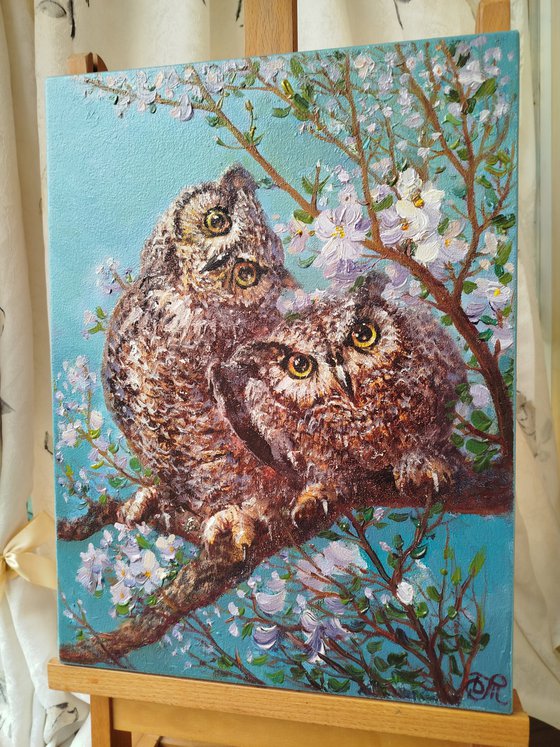 Spring landscape with owls