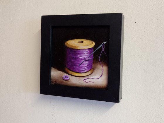 Little Purple  cotton reel  still life