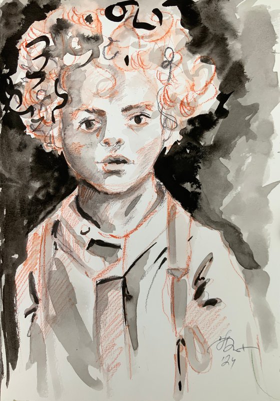Portrait of a curly-haired boy