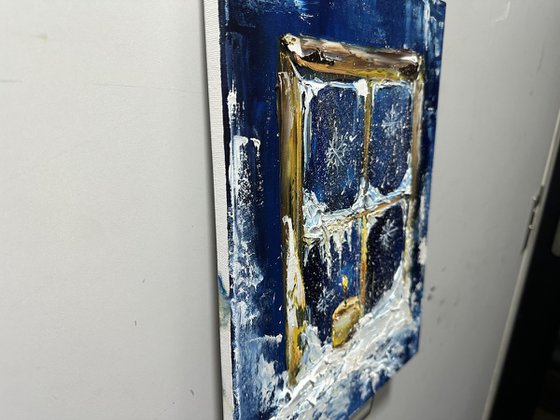 Winter window and candle