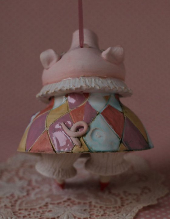 Little piggy in harlequin dress. Hanging sculpture, bell doll by Elya Yalonetski