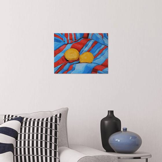 Lemons on the tablecloth. Still life. 30x40cm