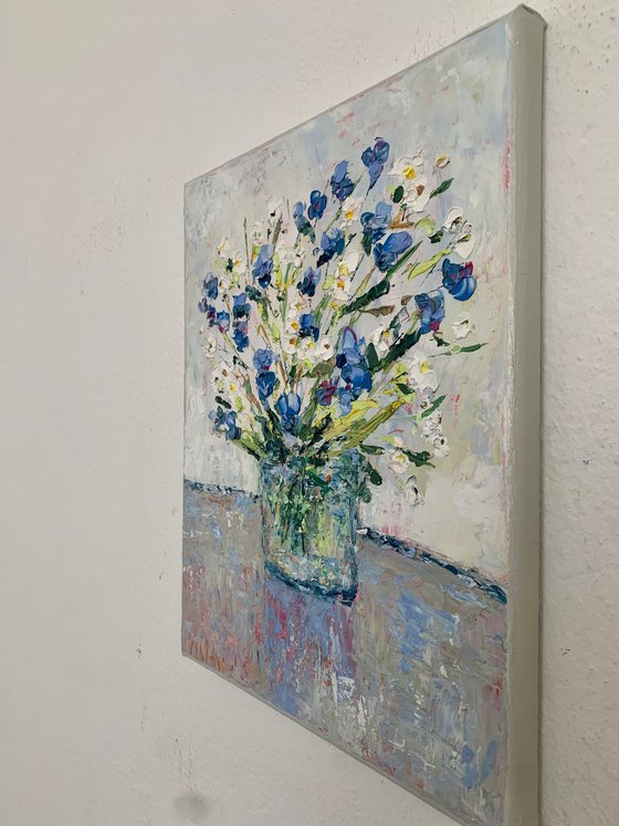 Bouquet of daisies and cornflowers