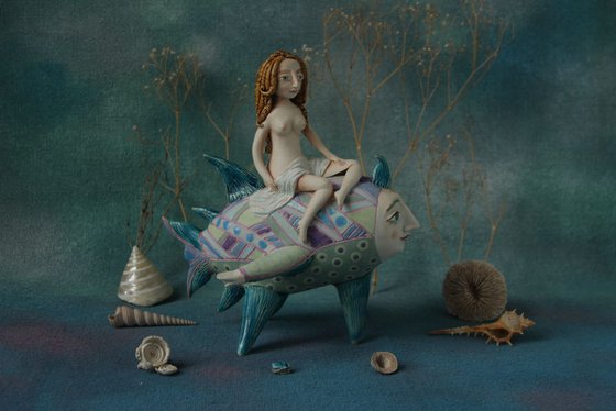 Girl riding the moon fish. Sculpture by Elya Yalonetski, 2018