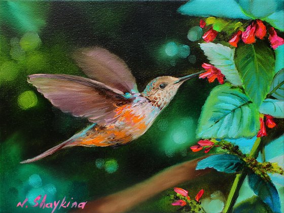 Hummingbird and Red Flowers