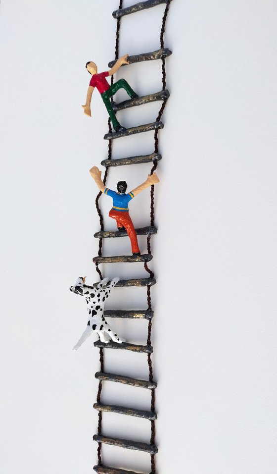 Boys and the dog on ladder