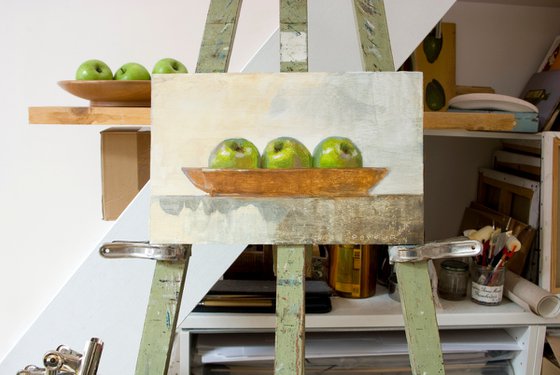 modern still life of green apples