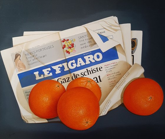 Le Figaro with oranges
