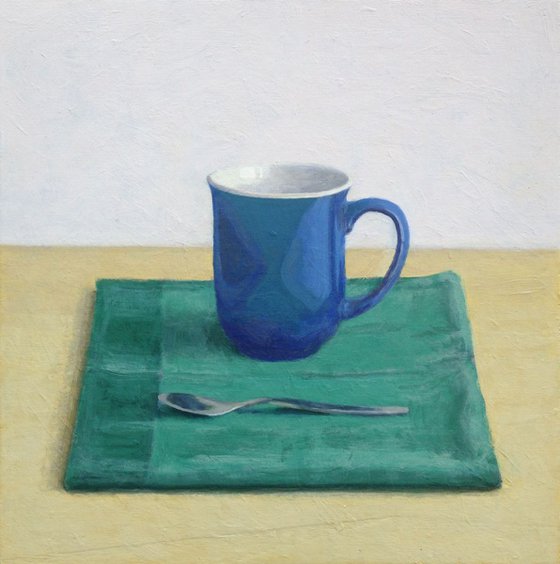 Blue mug and spoon
