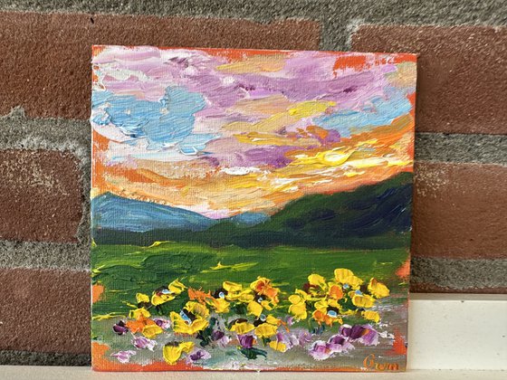 Orange sunset with flowers