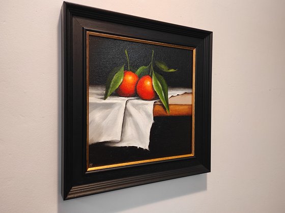 Clementines on cloth still life