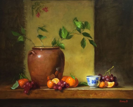 Still life with flower pot, tanderines and grapes. Framed painting. Oil on linen