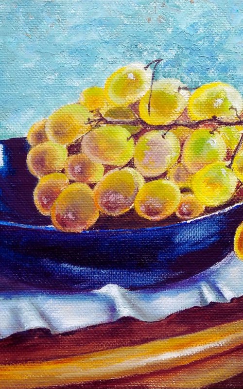Autumn grapes on a blue plate by Liubov Samoilova