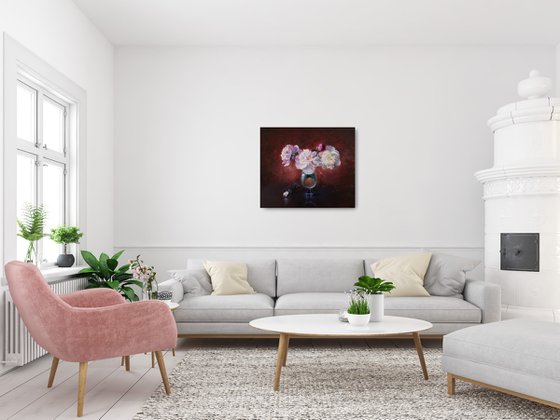 Peonies bouquet in a glass vase