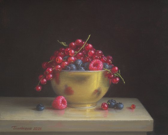 Berries in a golden bowl