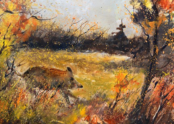 A running wild boar