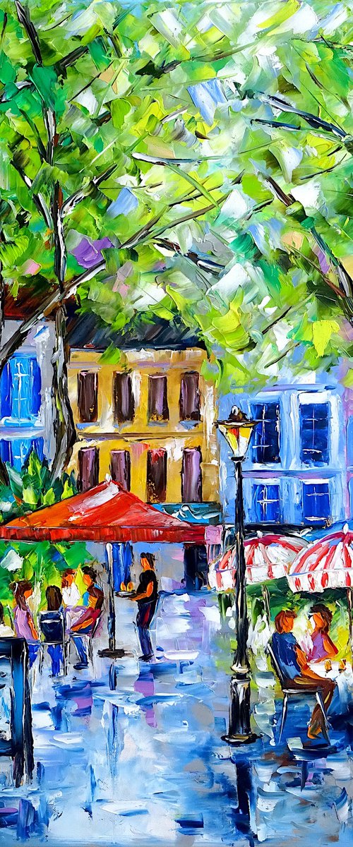 In a Parisian Street Café by Mirek Kuzniar