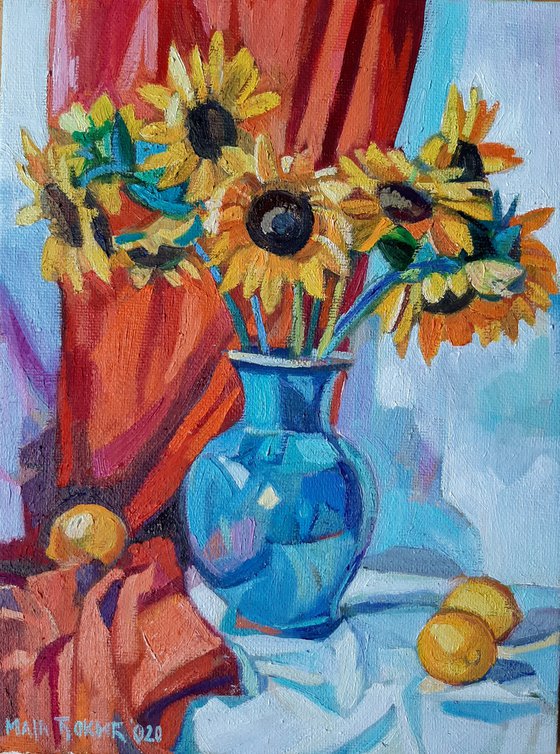 Still life with sunflowers and red drapery