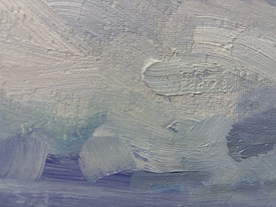 Clouds over the field and ditch