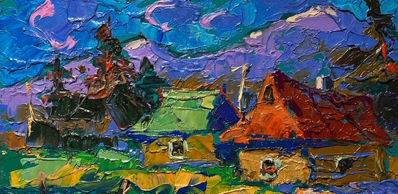 Village and blue mountains
