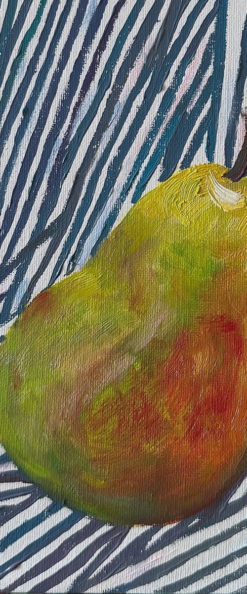 Green pear on blue by Irina Sherbiak
