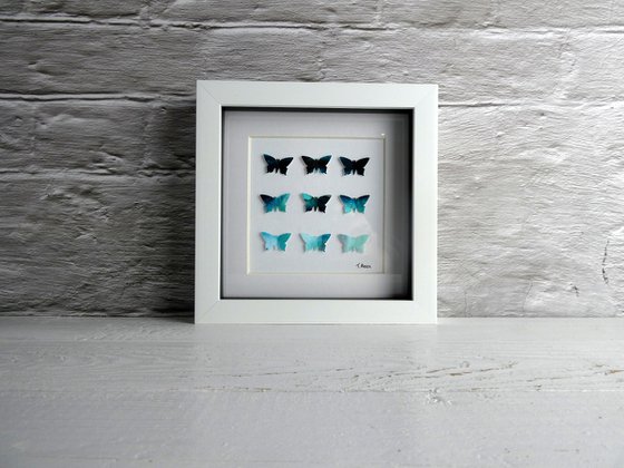 9 Emerald butterflies