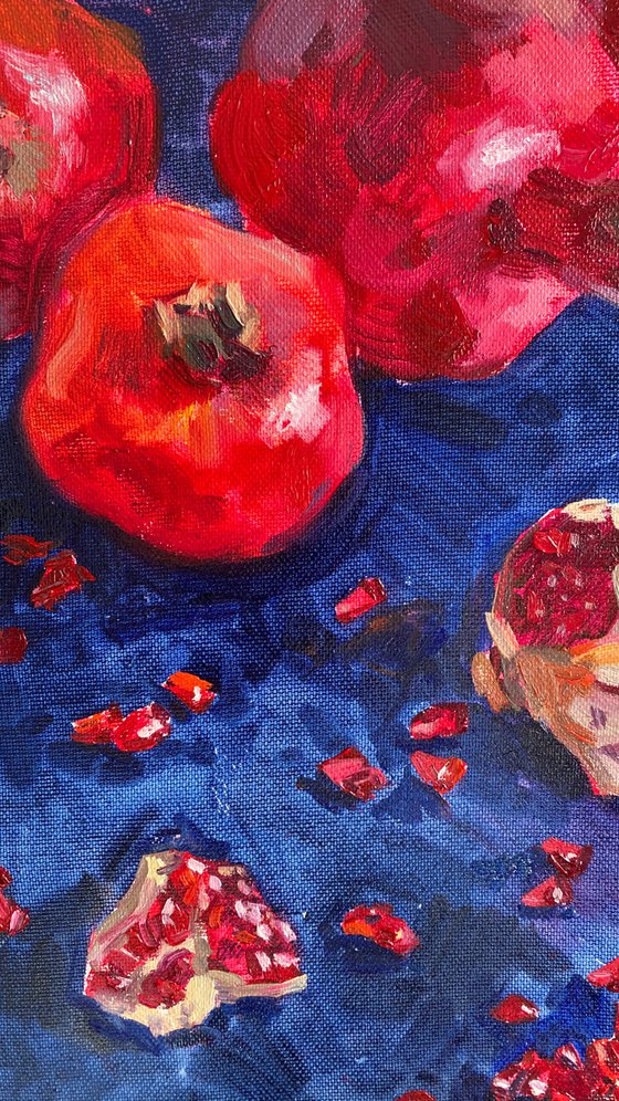 Pomegranates on blue