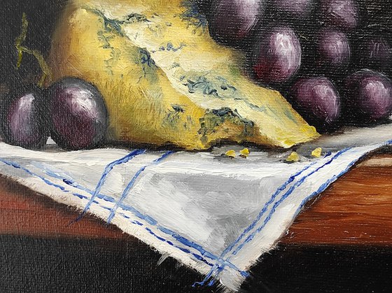 Cheese and grapes still life