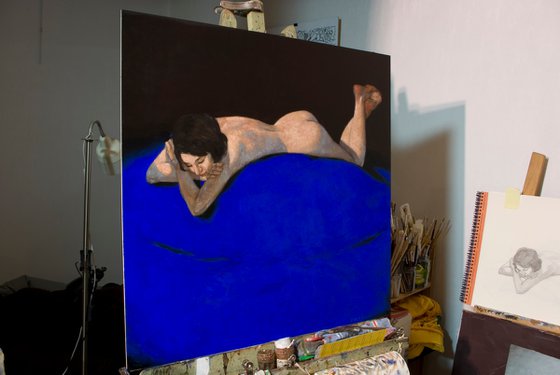 portrait of a nude woman on blue background