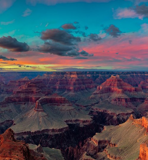 Painted Skies: Grandeur of The Grand Canyon by Nick Psomiadis