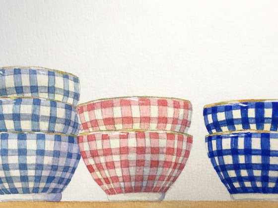 Chequered bowls in a row