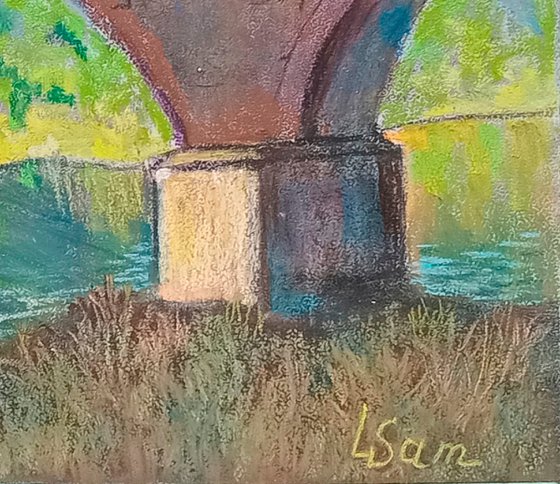 Sunlit Toledo's Town Bridge