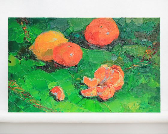 Tangerines on green