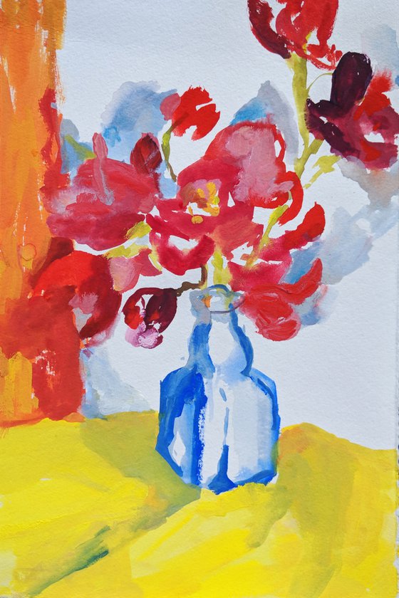 Orchids and blue vase
