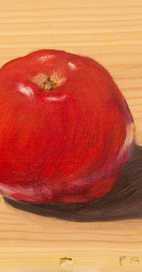 red apple on a wood board for food lovers by Olivier Payeur