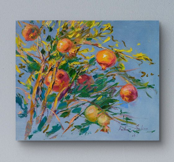 Pomegranate on gray blue