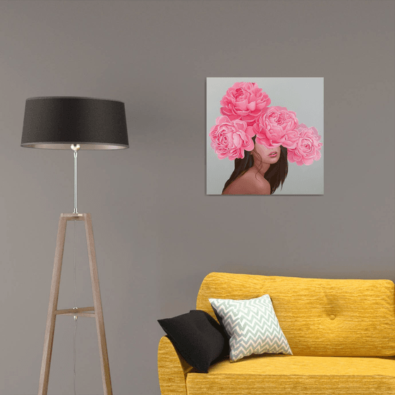 Girl and peony blossom