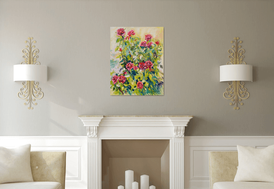 A bush of roses in a garden