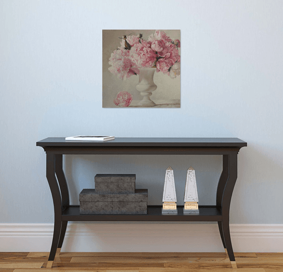 Bouquet of peonies in a white vase