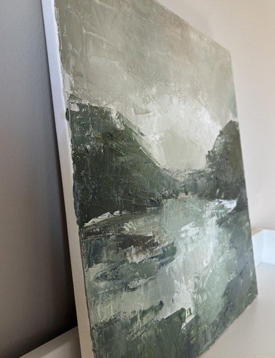 Dark textured green lagoon river mountains