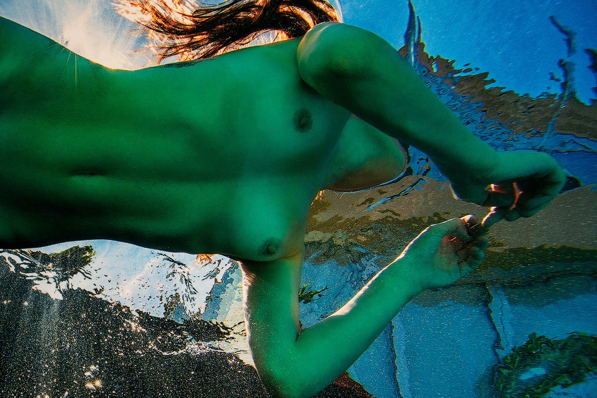 The Real Mermaid - underwater photo of naked young woman in sunbeams -  print on aluminum Photograph by Alex Sher | Artfinder