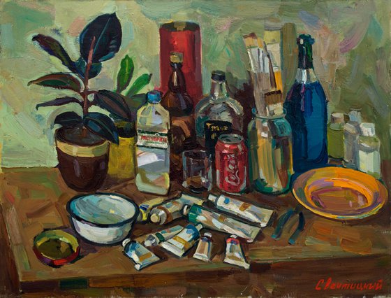Still life with paints and  ficus