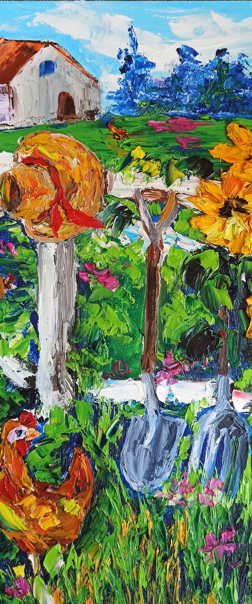 Hat on the fence in the village by Oksana Fedorova
