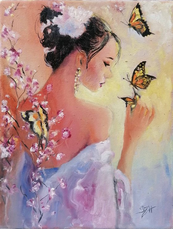 Portrait of a girl playing with Butterflies