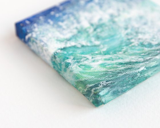 Miniature blue ocean waves
