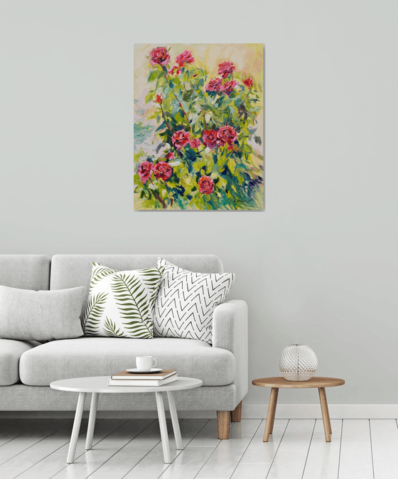 A bush of roses in a garden