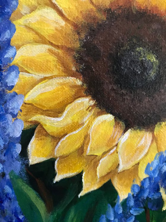 Sunflowers with blue salvia