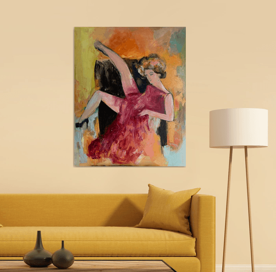 Woman sitting on the armchair