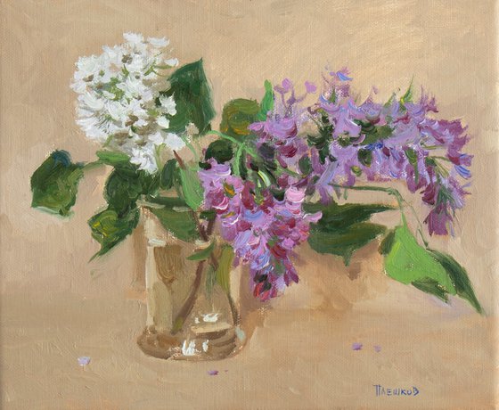 Lilacs in a Transparent glass